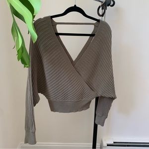 Green ribbed knot sweater